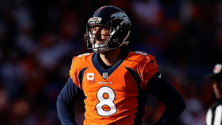 Dec 18, 2022; Denver, Colorado, USA; Denver Broncos place kicker Brandon McManus (8) watches his Dec 18, 2022; Denver, Colorado, USA; Denver Broncos place kicker Brandon McManus (8) watches his