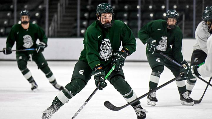 Michigan State's Sean Barnhill moves the puck during hockey practice on Thursday, Sept. 25, 2025, at Munn Arena in East Lansing.