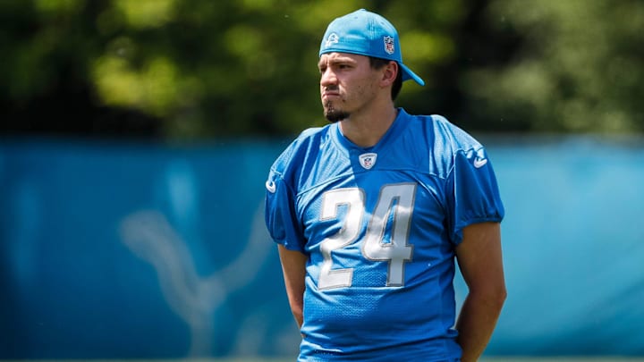 Detroit Lions place kicker John Parker Romo (24) watches practice during OTAs at Detroit Lions headquarters in Allen Park on Thursday, June 1, 2023.