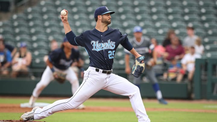 Blair Henley pitches for the Hooks during the exhibition game against Texas A&M-Kingsville at
