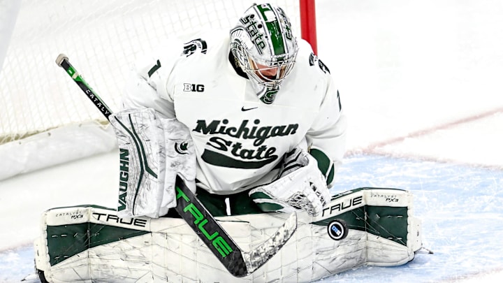 Michigan State's goalie Trey Augustine makes a stop in the first period of the Big Ten tournament game against Ohio State on Saturday, March 16, 2024, at Munn Arena in East Lansing.
