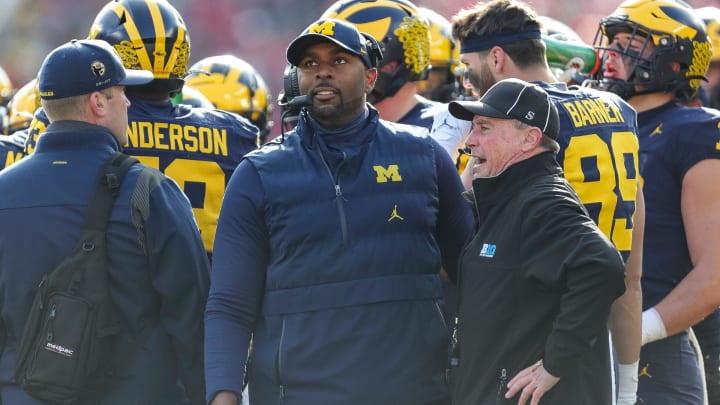 Michigan acting head coach Sherrone Moore watches a replay during the first half against Ohio State at Michigan Stadium in Ann Arbor on Saturday, Nov. 25, 2023.