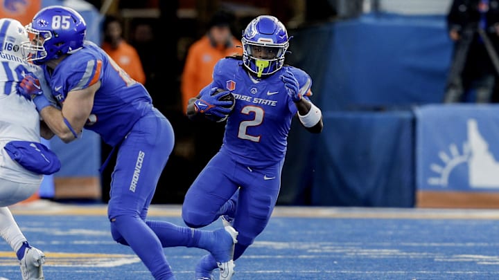 Nov 24, 2023; Boise, Idaho, USA;  Boise State Broncos running back Ashton Jeanty (2) carries the ball during the second half against the Air Force Falcons at Albertsons Stadium. Boise State defeats Air Force 27-19. Mandatory Credit: Brian Losness-USA TODAY Sports


