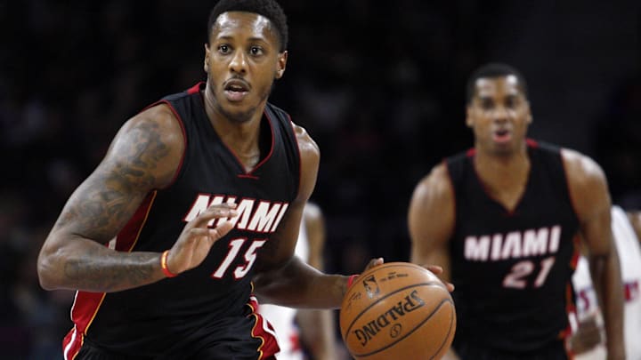 Apr 4, 2015; Auburn Hills, MI, USA; Miami Heat guard Mario Chalmers (15) dribbles the ball up the court during the first quarter against the Detroit Pistons at The Palace of Auburn Hills. Mandatory Credit: Raj Mehta-Imagn Images Apr 4, 2015; Auburn Hills, MI, USA; Miami Heat guard Mario Chalmers (15) dribbles the ball up the court during the first quarter against the Detroit Pistons at The Palace of Auburn Hills. Mandatory Credit: Raj Mehta-Imagn Images
