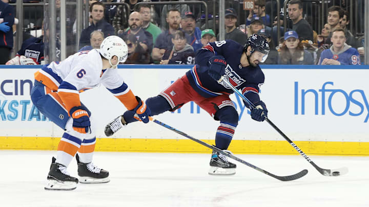 Mar 17, 2024; New York, New York, USA; New York Rangers left wing Chris Kreider (20) shoots the puck