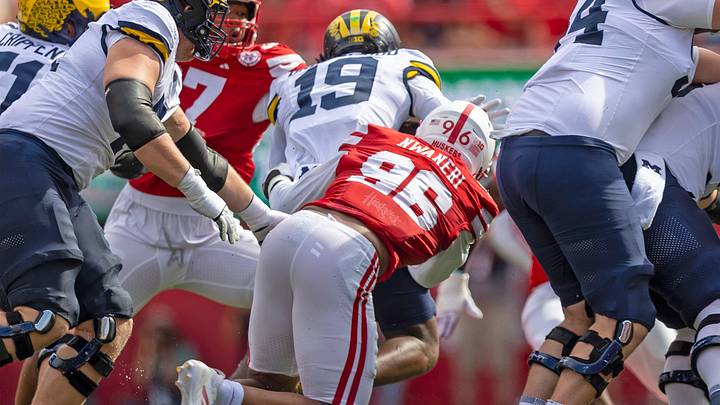 Nebraska's Williams Nwaneri pursues Michigan quarterback Bryce Underwood, who lost a fumble on the play. Nebraska's Williams Nwaneri pursues Michigan quarterback Bryce Underwood, who lost a fumble on the play.