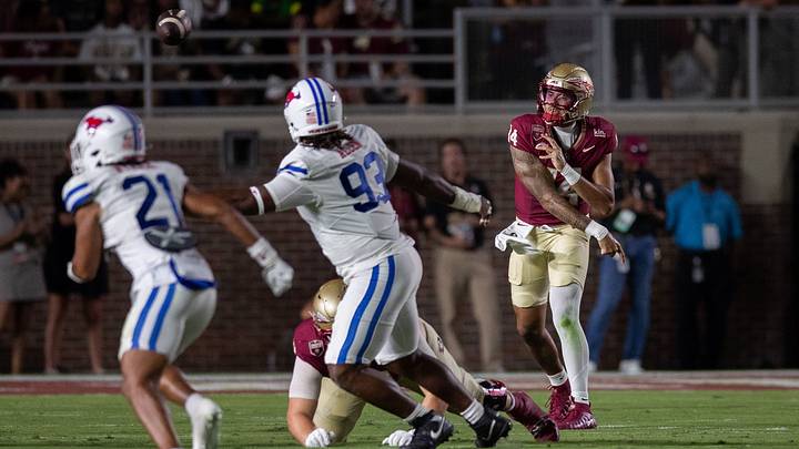 Florida State Seminoles quarterback Ashton Daniels (14) passes to his teammate. The SMU Mustangs lead the Florida State Seminoles 17-10 at the end of the first half Monday, Sept. 7, 2026.