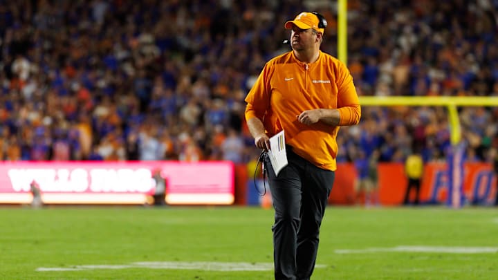 Nov 22, 2025; Gainesville, Florida, USA; Tennessee Volunteers head coach Josh Heupel looks on against the Florida Gators during the first half at Ben Hill Griffin Stadium.