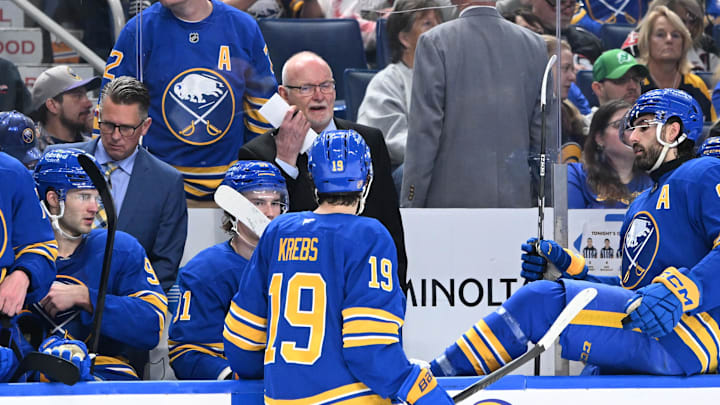 Apr 15, 2026; Buffalo, New York, USA; Buffalo Sabres head coach Lindy Ruff gives instruction before a overtime period against the Dallas Stars at KeyBank Center. Mandatory Credit: Mark Konezny-Imagn Images