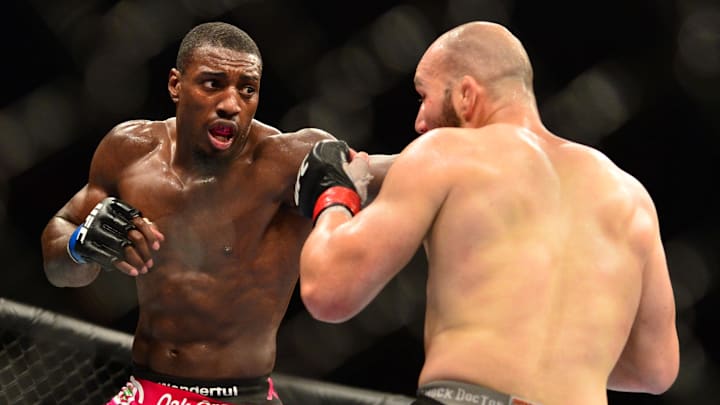 Phil Davis (left) fights Glover Teixeira during a UFC event in Brazil. 