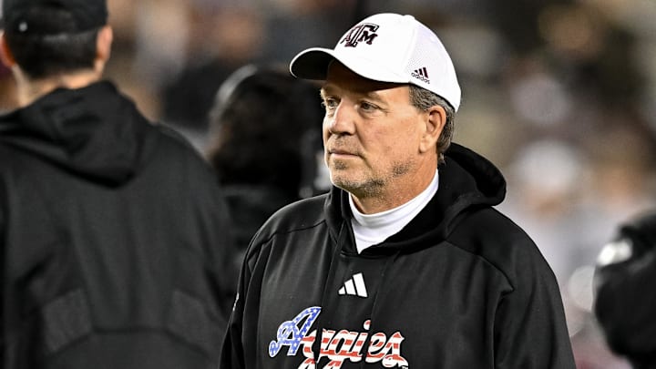 Nov 11, 2023; College Station, Texas, USA; Texas A&M Aggies head coach Jimbo Fisher looks on during warm ups prior to the game against the Mississippi State Bulldogs at Kyle Field. Mandatory Credit: Maria Lysaker-Imagn Images