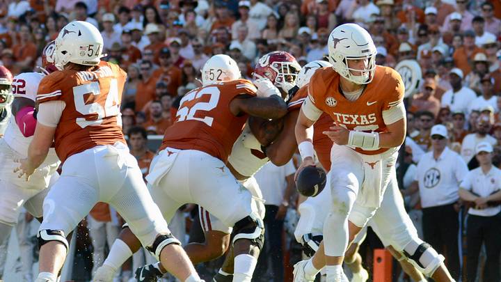 Texas quarterback Arch Manning competes against Oklahoma.