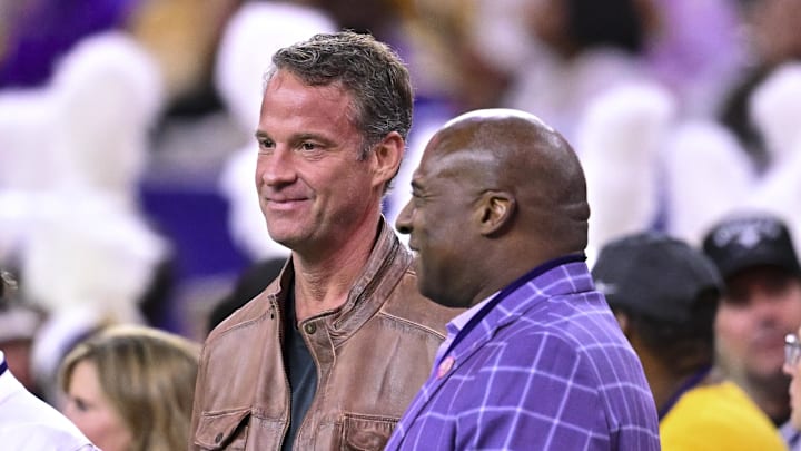 Houston, TX, USA; Louisiana State Tigers head coach Lane Kiffin, left, stands next to Louisiana State Tigers athletic director Verge Ausberry, right, prior to the game against the Houston Cougars at NRG Stadium. Houston, TX, USA; Louisiana State Tigers head coach Lane Kiffin, left, stands next to Louisiana State Tigers athletic director Verge Ausberry, right, prior to the game against the Houston Cougars at NRG Stadium.