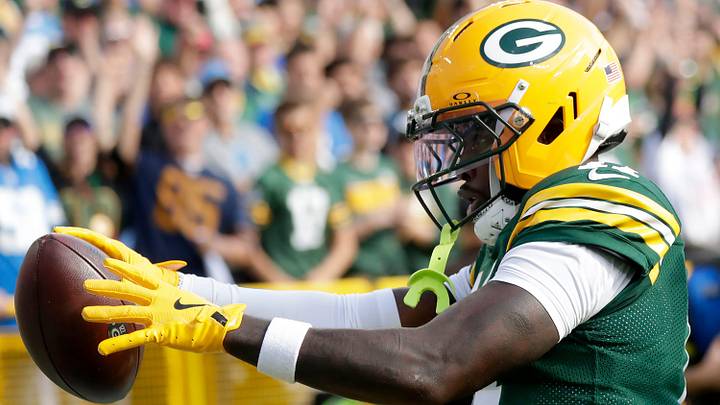 Green Bay Packers receiver Jayden Reed (11) catches a touchdown pass against the Detroit Lions.