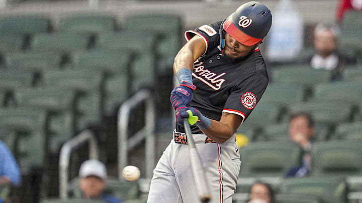 Sep 23, 2025; Cumberland, Georgia, USA; Washington Nationals left fielder James Wood (29) hits a double against the Atlanta Braves during the first inning at Truist Park. 