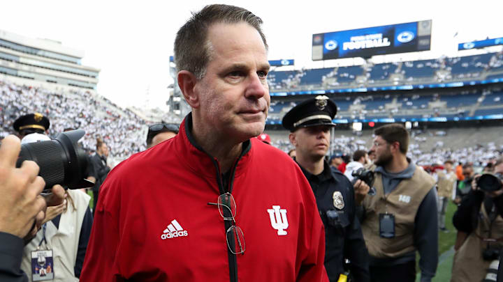 Indiana Hoosiers head coach Curt Cignetti walks off the field following his team's win over the Penn State Nittany Lions at Beaver Stadium. Indiana Hoosiers head coach Curt Cignetti walks off the field following his team's win over the Penn State Nittany Lions at Beaver Stadium.
