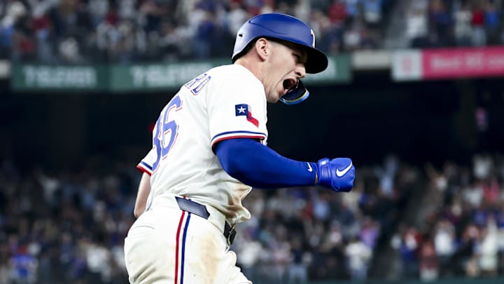 Apr 5, 2025; Arlington, Texas, USA; Texas Rangers left fielder Wyatt Langford (36) reacts after hitting a two-run home run during the seventh inning against the Tampa Bay Rays at Globe Life Field. 