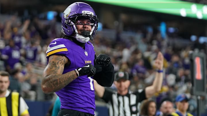 Dec 14, 2025; Arlington, Texas, USA; Minnesota Vikings wide receiver Jalen Nailor (1) celebrates after a touchdown catch during the second half against the Dallas Cowboys at AT&T Stadium.