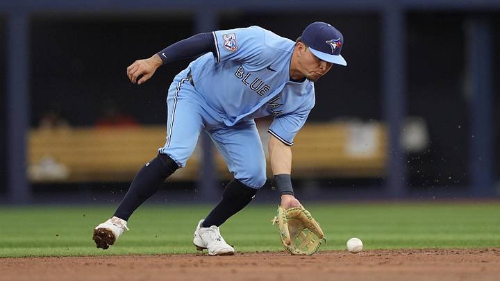 Jun 24, 2026; Toronto, Ontario, CAN; Toronto Blue Jays second baseman Luis Urias (48) fields a ground ball hit by Houston Astros catcher Yainer Diaz (not pictured) during the second inning at Rogers Centre. Mandatory Credit: John E. Sokolowski-Imagn Images