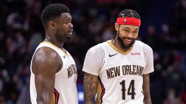 Dec 31, 2023; New Orleans, Louisiana, USA; New Orleans Pelicans forward Zion Williamson (1) and forward Brandon Ingram (14) share a laugh after a play against the Los Angeles Lakers during the second half at Smoothie King Center. Dec 31, 2023; New Orleans, Louisiana, USA; New Orleans Pelicans forward Zion Williamson (1) and forward Brandon Ingram (14) share a laugh after a play against the Los Angeles Lakers during the second half at Smoothie King Center.