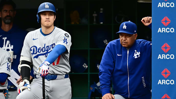 May 28, 2025; Cleveland, Ohio, USA; Los Angeles Dodgers designated hitter Shohei Ohtani (17) waits next to manager Dave Roberts (30) for his turn to bat during the ninth inning against the Cleveland Guardians at Progressive Field. Mandatory Credit: Ken Blaze-Imagn Images May 28, 2025; Cleveland, Ohio, USA; Los Angeles Dodgers designated hitter Shohei Ohtani (17) waits next to manager Dave Roberts (30) for his turn to bat during the ninth inning against the Cleveland Guardians at Progressive Field. Mandatory Credit: Ken Blaze-Imagn Images
