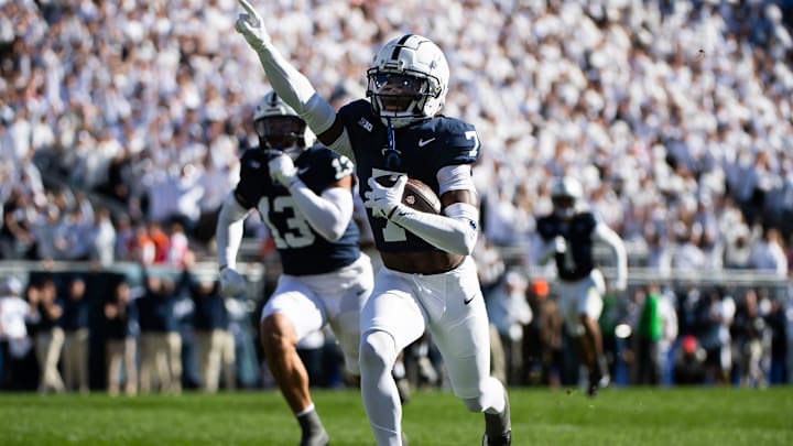 Penn State Nittany Lions cornerback Zion Tracy returns an interception for a touchdown against the Ohio State Buckeyes in 2024.
