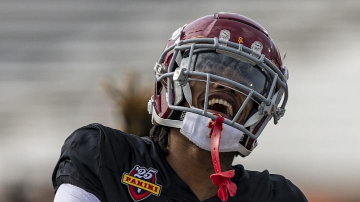 Jan 28, 2025; Mobile, AL, USA; National team defensive back Jaylin Smith of USC (21) celebrates after a play during Senior Bowl practice for the National team at Hancock Whitney Stadium. Mandatory Credit: Vasha Hunt-Imagn Images Jan 28, 2025; Mobile, AL, USA; National team defensive back Jaylin Smith of USC (21) celebrates after a play during Senior Bowl practice for the National team at Hancock Whitney Stadium. Mandatory Credit: Vasha Hunt-Imagn Images