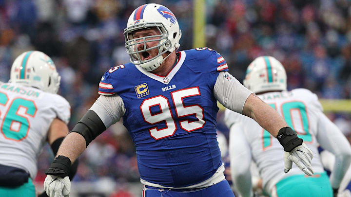 Bills Kyle Williams complains to an official that he was held as he rushed the passer in a 42-17 win over Miami. 

Jg 123018 Bills 10