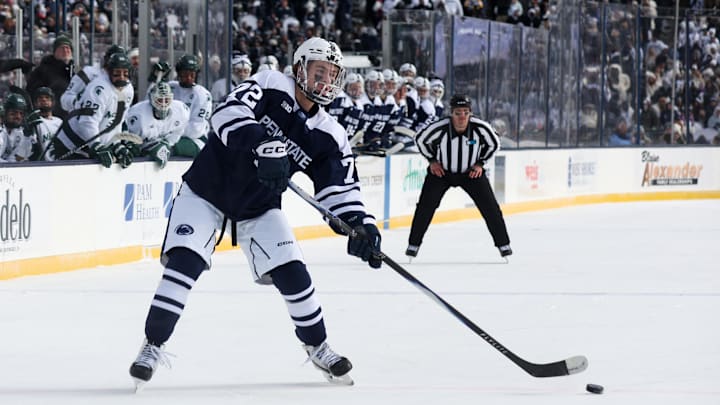 Penn State Nittany Lions forward Gavin McKenna looks to shoot the puck during the first period against the Michigan State Spartans at Beaver Stadium. Penn State Nittany Lions forward Gavin McKenna looks to shoot the puck during the first period against the Michigan State Spartans at Beaver Stadium.
