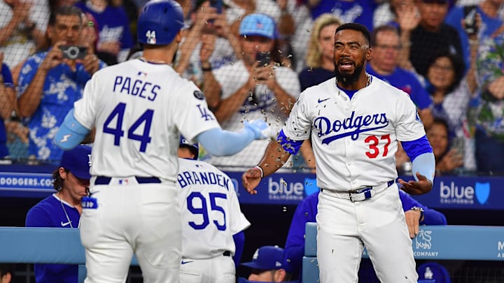 Jun 17, 2025; Los Angeles, California, USA; Los Angeles Dodgers center fielder Andy Pages (44) is greeted by right fielder Teoscar Hernández (37) after hitting a solo home run against the San Diego Padres during the fourth inning at Dodger Stadium. Mandatory Credit: Gary A. Vasquez-Imagn Images