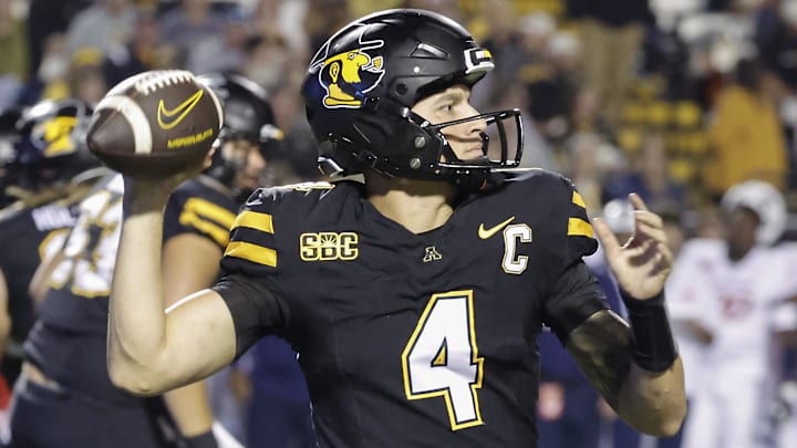 Sep 19, 2024; Boone, North Carolina, USA;  Appalachian State Mountaineers quarterback Joey Aguilar (4) throws a pass against the South Alabama Jaguars during the second quarter at Kidd Brewer Stadium. Mandatory Credit: Reinhold Matay-Imagn Images