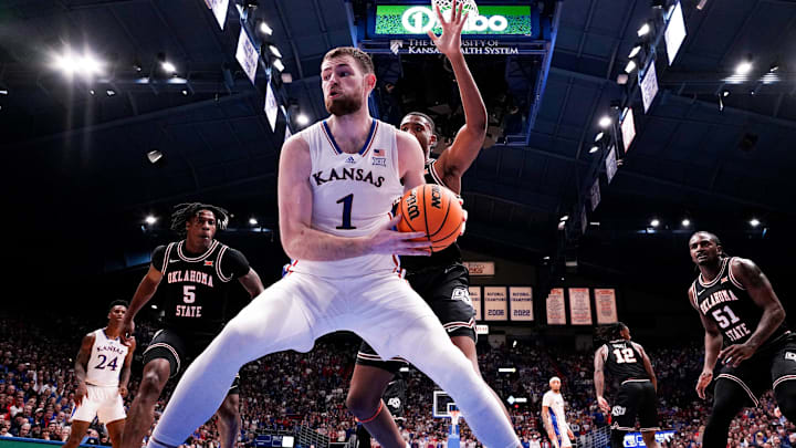 Jan 30, 2024; Lawrence, Kansas, USA; Kansas Jayhawks center Hunter Dickinson (1) rebounds as