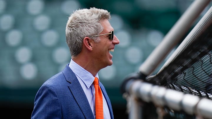 Jul 27, 2022; Baltimore, Maryland, USA;  Baltimore Orioles general manager Mike Elias reacts on the field before the game between the Baltimore Orioles and the Tampa Bay Rays.