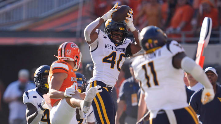 West Virginia Mountaineers linebacker Josiah Trotter (40) intercepts a pass during a college football game between the Oklahoma State Cowboys (OSU) and the West Virginia Mountaineers at Boone Pickens Stadium in Stillwater, Okla., Saturday, Oct. 5, 2024.