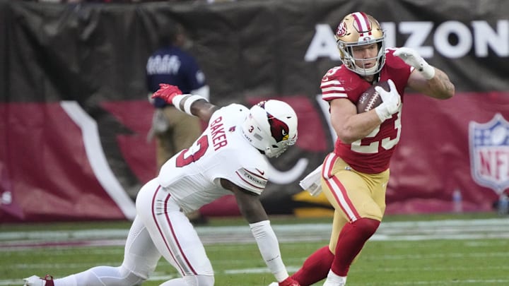 San Francisco 49ers running back Christian McCaffrey (23) is defended by Arizona Cardinals safety Budda Baker (3) during the second quarter at State Farm Stadium in Glendale on Dec. 17, 2023. San Francisco 49ers running back Christian McCaffrey (23) is defended by Arizona Cardinals safety Budda Baker (3) during the second quarter at State Farm Stadium in Glendale on Dec. 17, 2023.