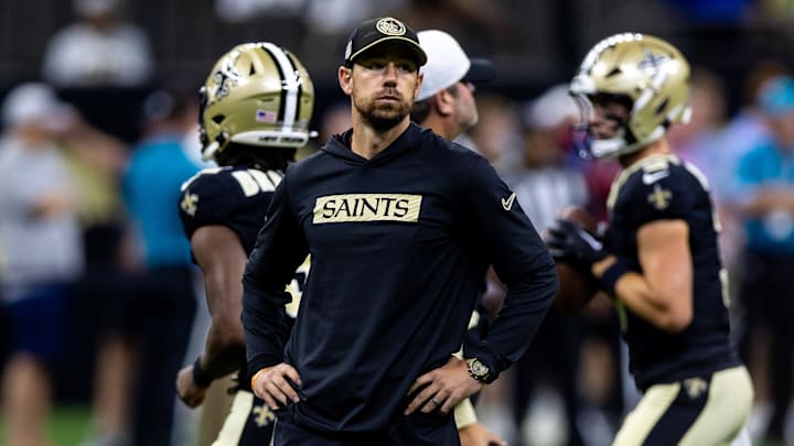 Aug 25, 2024; New Orleans, Louisiana, USA;  New Orleans Saints offensive coordinator Klint Kubiak during the warmups before the game against the Tennessee Titans at Caesars Superdome. Mandatory Credit: Stephen Lew-Imagn Images
