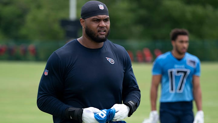 Tennessee Titans tackle Dan Moore Jr. (75) finishes up practice during OTAs at Ascension Saint Thomas Sports Park in Nashville, Tenn., Wednesday, May 28, 2025.