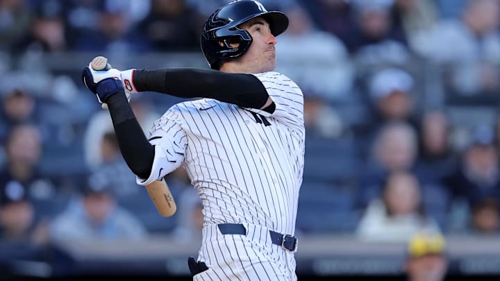 Mar 27, 2025; Bronx, New York, USA; New York Yankees center fielder Cody Bellinger (35) follows through on an RBI sacrifice fly during the seventh inning against the Milwaukee Brewers at Yankee Stadium. Mar 27, 2025; Bronx, New York, USA; New York Yankees center fielder Cody Bellinger (35) follows through on an RBI sacrifice fly during the seventh inning against the Milwaukee Brewers at Yankee Stadium.