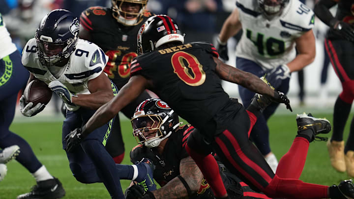 Jan 3, 2026; Santa Clara, California, USA; Seattle Seahawks running back Kenneth Walker III (9) rushes the ball against the San Francisco 49ers during the first half at Levi's Stadium. Mandatory Credit: Neville E. Guard-Imagn Images