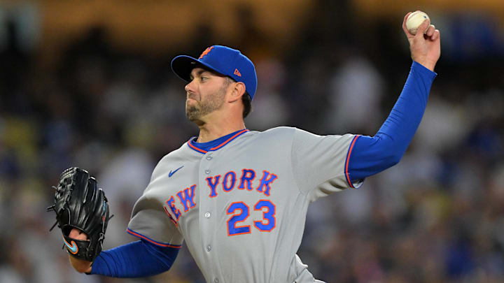 Apr 13, 2026; Los Angeles, California, USA; New York Mets pitcher David Peterson (23) throws pitch against the Los Angeles Dodgers during the first inning at Dodger Stadium. Mandatory Credit: Jayne Kamin-Oncea-Imagn Images