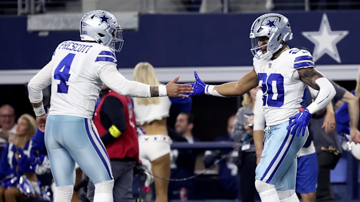 Dec 11, 2022; Arlington, Texas, USA;  Dallas Cowboys running back Tony Pollard (20) celebrates with