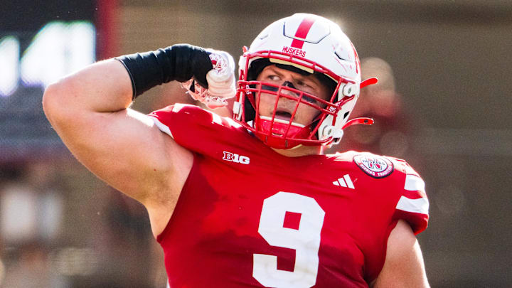 Oct 5, 2024; Lincoln, Nebraska, USA; Nebraska Cornhuskers defensive lineman Ty Robinson (9) celebrates after a sack against the Rutgers Scarlet Knights during the second quarter at Memorial Stadium. Mandatory Credit: Dylan Widger-Imagn Images Oct 5, 2024; Lincoln, Nebraska, USA; Nebraska Cornhuskers defensive lineman Ty Robinson (9) celebrates after a sack against the Rutgers Scarlet Knights during the second quarter at Memorial Stadium. Mandatory Credit: Dylan Widger-Imagn Images