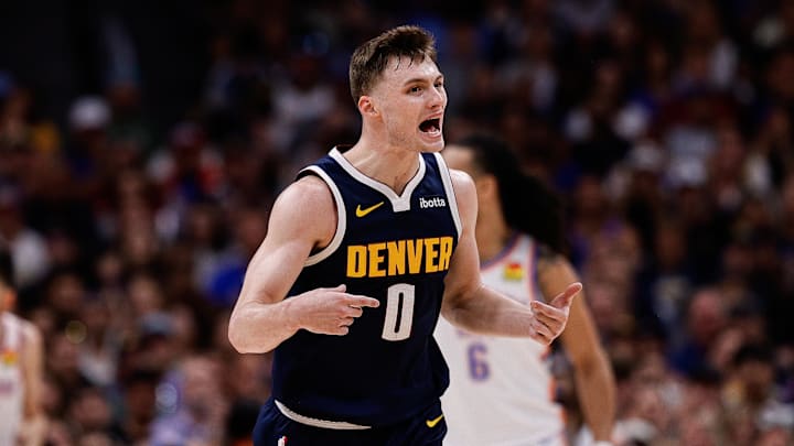 May 11, 2025; Denver, Colorado, USA; Denver Nuggets guard Christian Braun (0) reacts after a play in the second quarter against the Oklahoma City Thunder during game four of the second round of the 2025 NBA Playoffs at Ball Arena. Mandatory Credit: Isaiah J. Downing-Imagn Images