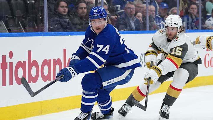 Jan 23, 2026; Toronto, Ontario, CAN; Toronto Maple Leafs center Bobby McMann (74) battles for the puck with Vegas Golden Knights defenseman Noah Hanifin (15) during the third period at Scotiabank Arena. Mandatory Credit: Nick Turchiaro-Imagn Images Jan 23, 2026; Toronto, Ontario, CAN; Toronto Maple Leafs center Bobby McMann (74) battles for the puck with Vegas Golden Knights defenseman Noah Hanifin (15) during the third period at Scotiabank Arena. Mandatory Credit: Nick Turchiaro-Imagn Images