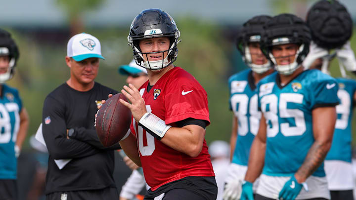Jul 26, 2024; Jacksonville, FL, USA; Jacksonville Jaguars quarterback Mac Jones (10) participates in training camp at Miller Electric Center. Mandatory Credit: Nathan Ray Seebeck-USA TODAY Sports