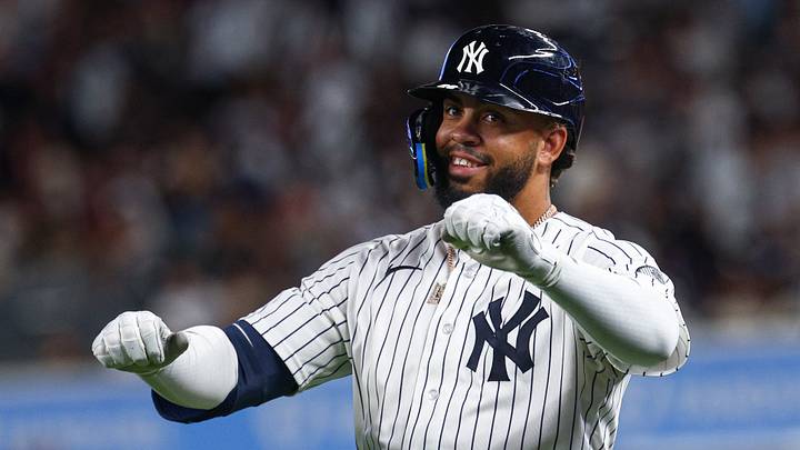 Aug 26, 2026; Bronx, New York, USA; New York Yankees first baseman Luis Garcia Jr. (26) reacts after an infield single during the seventh inning against the Houston Astros at Yankee Stadium. Mandatory Credit: Vincent Carchietta-Imagn Images