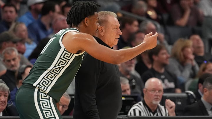 March 21, 2024, Charlotte, NC, USA; Michigan State Spartans guard A.J. Hoggard (11) with head coach March 21, 2024, Charlotte, NC, USA; Michigan State Spartans guard A.J. Hoggard (11) with head coach