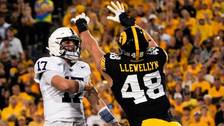 Iowa Hawkeyes defensive end Max Llewellyn (48) pressures Penn State Nittany Lions quarterback Ethan Grunkemeyer (17)