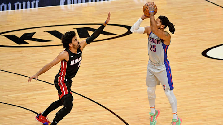 Jan 18, 2021; Miami, Florida, USA; Detroit Pistons guard Derrick Rose (25) attempts a three point shot over Miami Heat guard Gabe Vincent (2) during the first half at American Airlines Arena. Mandatory Credit: Jasen Vinlove-Imagn Images