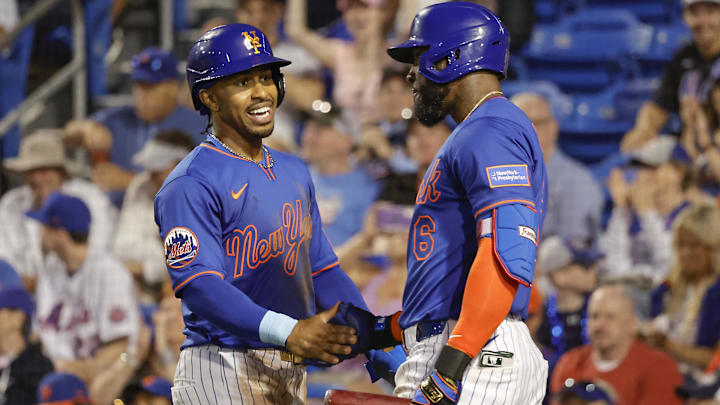 Mar 14, 2025; Port St. Lucie, Florida, USA;  New York Mets outfielder Starling Marte (6) congratulates shortstop Francisco Lindor (12) after scoring during the sixth inning against the St. Louis Cardinals at Clover Park. Mandatory Credit: Reinhold Matay-Imagn Images